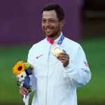 Schauffele with 2 clutch putts gives U.S. golf gold