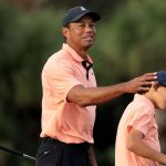 Tiger shoots scramble 62 with son in return