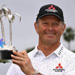 Goosen wins Champions event after wet finish