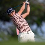 Iwai leads at windy Hoakalei, 8 one shot behind