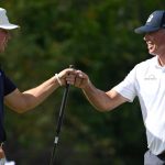 Kuchar, son cap emotional year with PNC victory